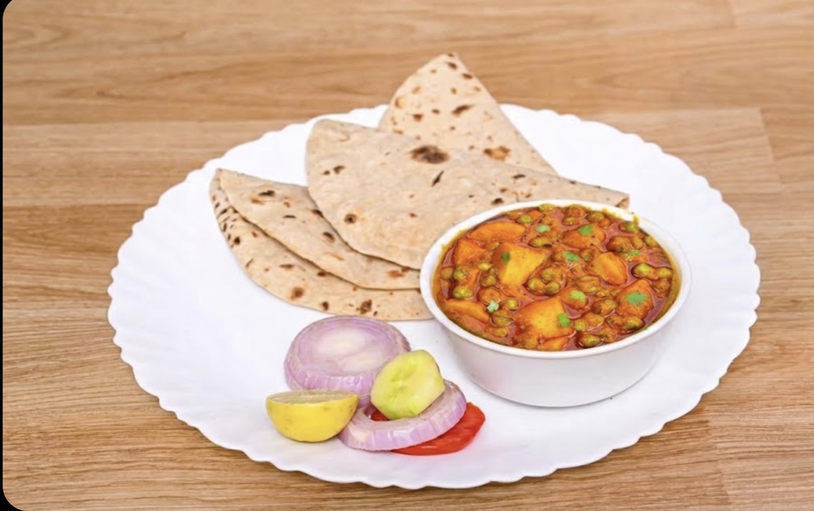 आलू मटर + 5 तंदूरी रोटी (butter) + सलाद