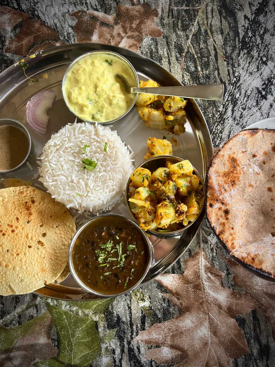 Special Thali (Green Salad, Papad, Seasonal Sabji, Matar Paneer, Dal Tadka, Jeera Rice, Butter Roti (5), Masala Chhach)